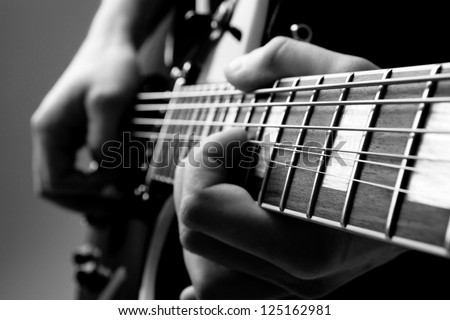 play the guitar Royalty-Free Stock Photo #125162981
