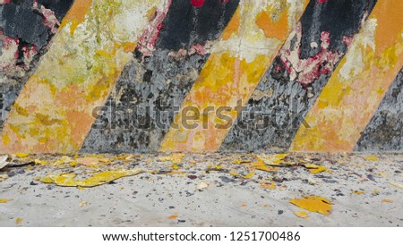 Footpath black and yellow color with brick wall background with free space  : Traffic signs background and texture concept