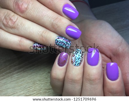 fashion manicure lilac and blue color and leopard design