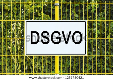 DSGVO german abbreviation Basic Data Protection Regulation Concept. General Data Protection Regulation Sign on yellow metal fence