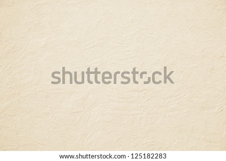beige colored house front, structured with spatula techniques, background design