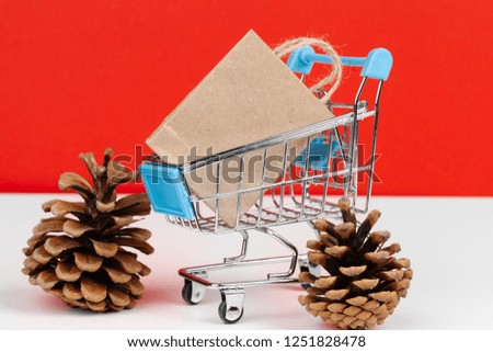 Small shopping cart with paper bags