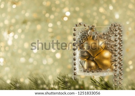 Christmas background, New year heart shaped lies in the glass goblet decoration. Abstract Blurred Bokeh Holiday. The Lights Flicker Out. Beautiful winter holiday background