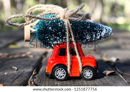Christmas tree on red car toy