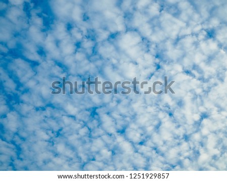 Fantastic clouds of good weather on blue sky background
