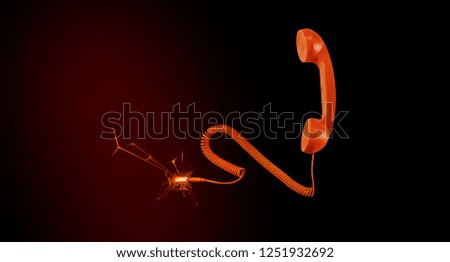 hot wire, fire on old fashioned telephone receiver, electric short circuit causing fire on telephone receiver