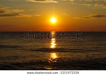 Colorful sunrise sunset above the Aegean sea.