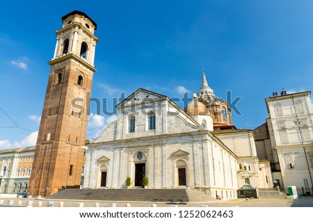 Duomo di Torino San Giovanni Battista catholic cathedral where the Holy Shroud of Turin is rested with bell tower and Sacra Sindone chapel on square in historical centre of Turin city, Piedmont, Italy Royalty-Free Stock Photo #1252062463