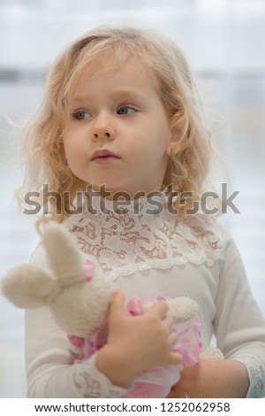 
little girl plays