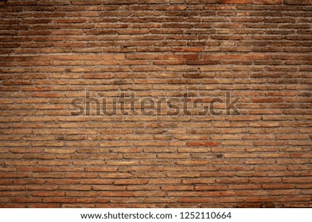 Ancient red brick. Red stone wall