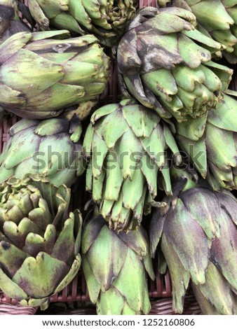 Green artichokes in the market