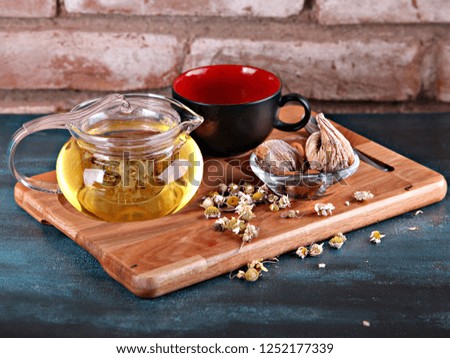 chamomile tea in wooden presentation