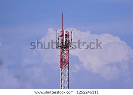4G and 5G cell site. Base Station or Base Transceiver Station. Wireless Communication Antenna Transmitter. Telecommunication tower with antennas with against blue sky and clouds.    