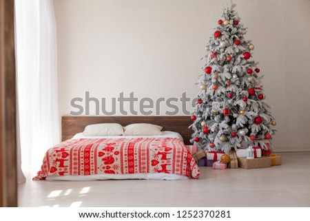 Christmas tree in the master bedroom bed holiday gifts new year White House decor