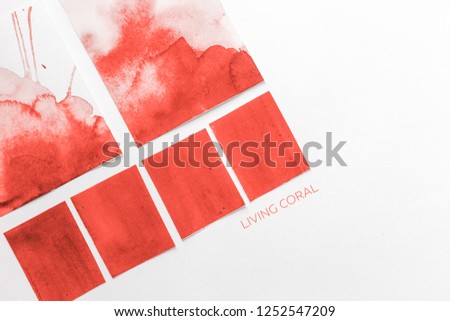 Color Palette Guide in mobile phone on White Background. flatlay. Color of the year 2019 Living coral