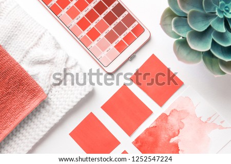 Color Palette Guide in mobile phone on White Background. flatlay. Color of the year 2019 Living coral Royalty-Free Stock Photo #1252547224