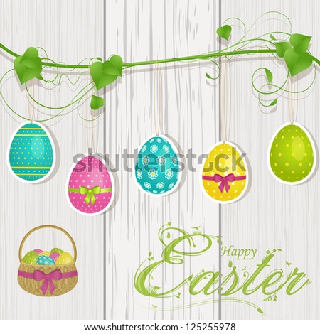 Easter Background with Hanging Easter Eggs and Basket on Wood