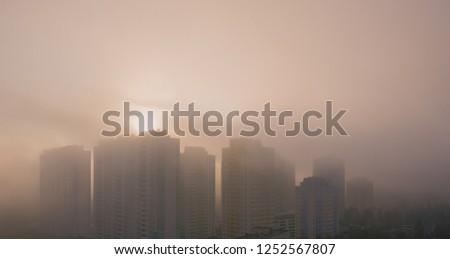 smog at the urban city Royalty-Free Stock Photo #1252567807