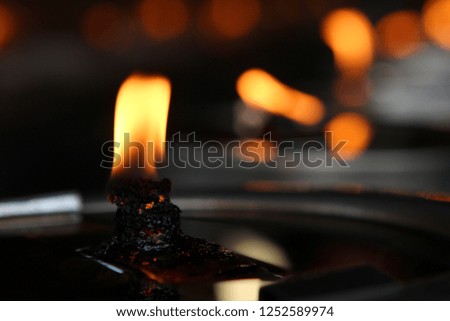 Candle flame Black background