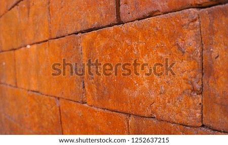 blur background with red brick wall
