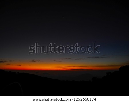 The wonderful of horizon or skyline just before sunrise at Doi Inthanon viewpoint, Chiang Mai, Thailand.