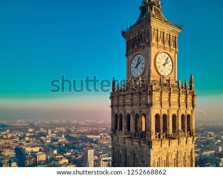 Beautiful panoramic aerial drone view to the center of Warsaw City and large clock of Palace of Culture and Science - a notable high-rise building in Warsaw, Poland Royalty-Free Stock Photo #1252668862