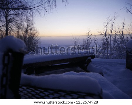 fireplace in winter landscape