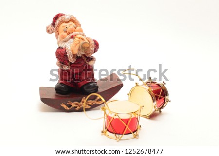 Merry Christmas. Santa Claus with drums.