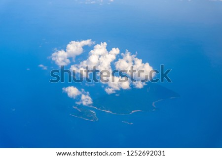 Islands in the sea with cloud , view from the plane
