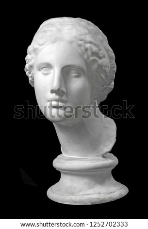 Sculpture of Venus de Milo gypsum head for artists isolated on black photo