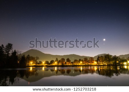 night panorama of lake leopoldskron in salzburg