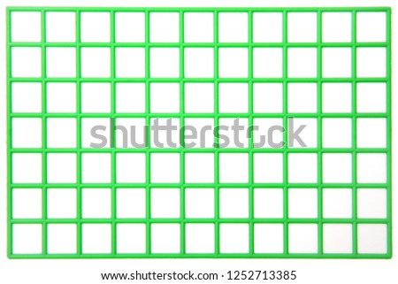 Green squares on white background, plastic cage pattern.