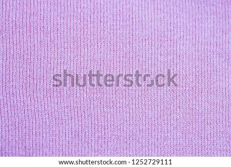 The texture on the background screen saver, mating, pigtails vertically, close-up. Color lilac