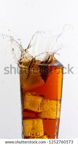 cola splash, there is some movement in the splashes close up