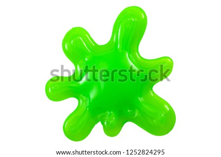 Practical joke splash, funny toy and slime splatter concept with a neon green blob of mucus or goo isolated on white background with a clip path cutout