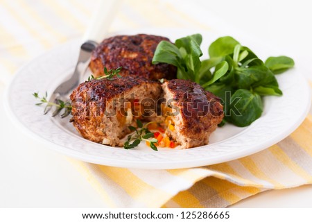 minced meat patties stuffed with vegetables and feta