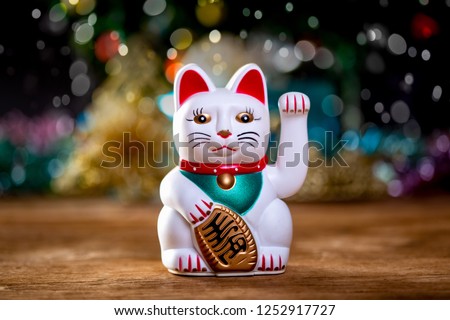 Maneki Neko (Good Luck Cat) Merry Xmas Royalty-Free Stock Photo #1252917727