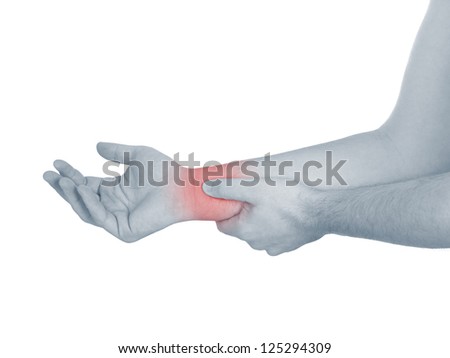 Acute pain in a man wrist. Male holding hand to spot of wrist pain. Concept photo with Color Enhanced blue skin with read spot indicating location of the pain. Isolation on a white background.