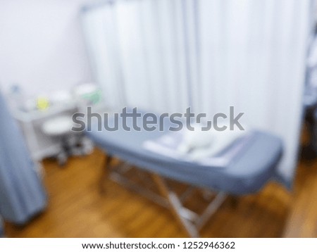 Blurred background with physician working in the injection room.