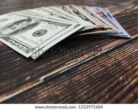 Close up Bitcoin with dollars on wooden floor, bitcoin, business payment, finance, make money,Gift set