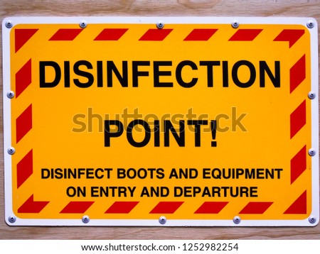 A sign from a New Zealand stock sale advertising the Disinfection point where boots are disinfected  