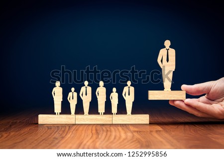 Successful team leader (manager, CEO, market leader) and another business leadership concepts. Royalty-Free Stock Photo #1252995856