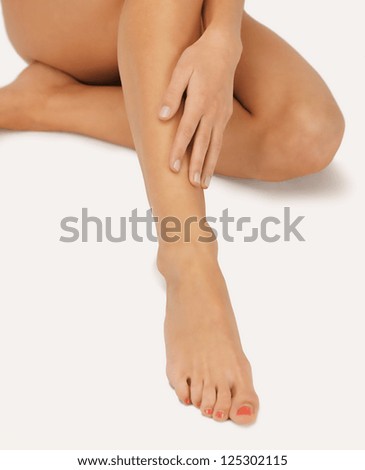 closeup picture of female hands and legs