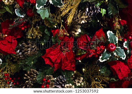 Christmas trees decorated with toys and flowers. Beautiful winter trees.