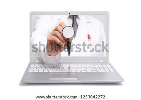 Telemedicine concept. Doctor with a stethoscope on the computer laptop screen. Royalty-Free Stock Photo #1253042272