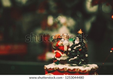 Christmas Decoration by Santa doll