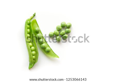 Isolated green pods. Sweet green pea. Top view. White background.  Royalty-Free Stock Photo #1253066143