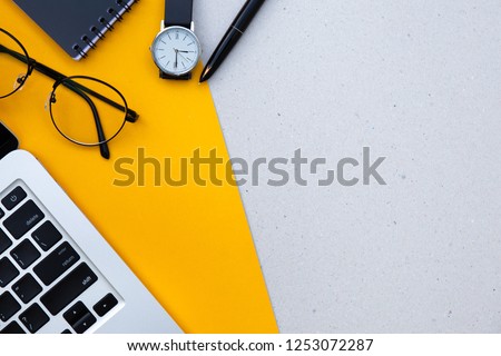 office desk table on yellow background empty copy space for text design studio creativity ideas for business equipment modern accessories at workplace.blogging,blog concept Royalty-Free Stock Photo #1253072287