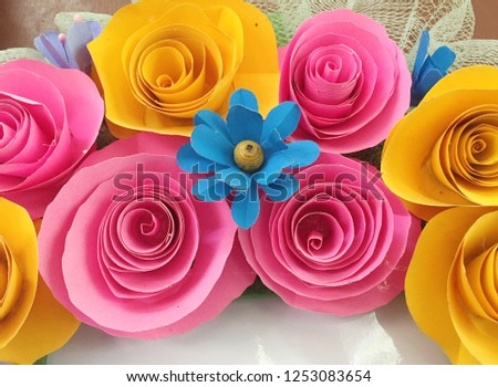 Roses are made from beautiful colored paper