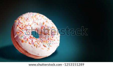 luxurious donut on a dark background with space for text